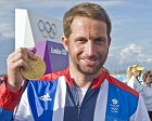 BEN AINSLIE WITH HIS GOLD MEDAL AT WEYMOUTH . PICTURE MURRAY SANDERS
